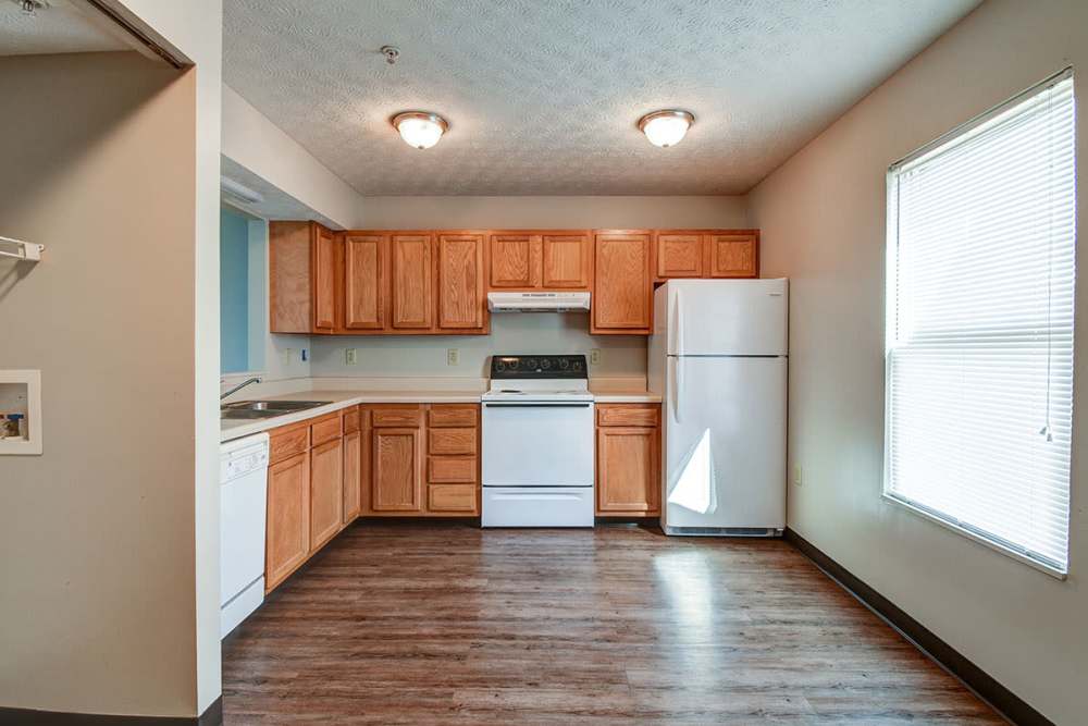 Fully equipped kitchen with appliances at Cedar Glen II in Morgantown, West Virginia
