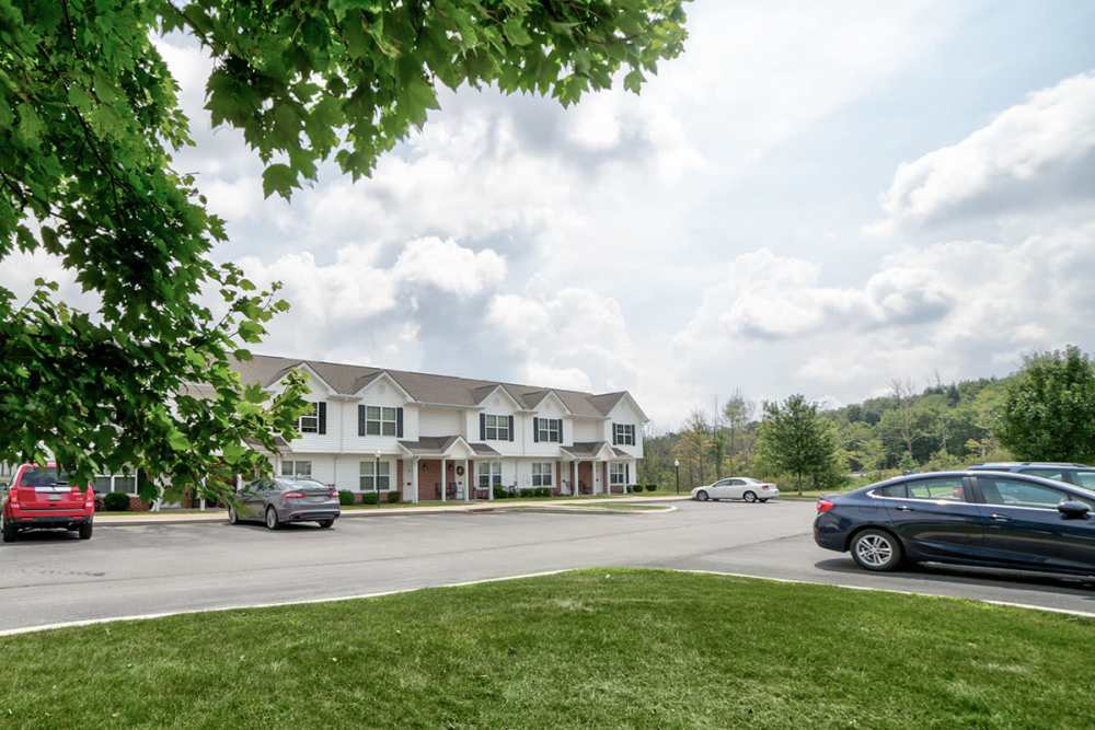 Apartment exterior with parking space at Crossroads Meadow in Ebensburg, Pennsylvania