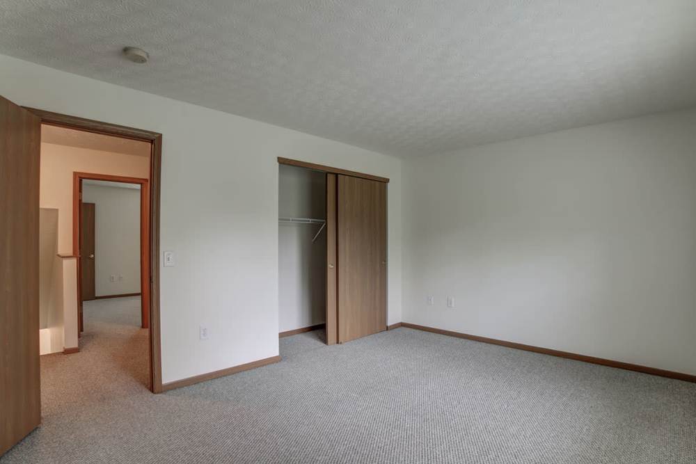 Bedroom with a closet at Crossroads Meadow in Ebensburg, Pennsylvania