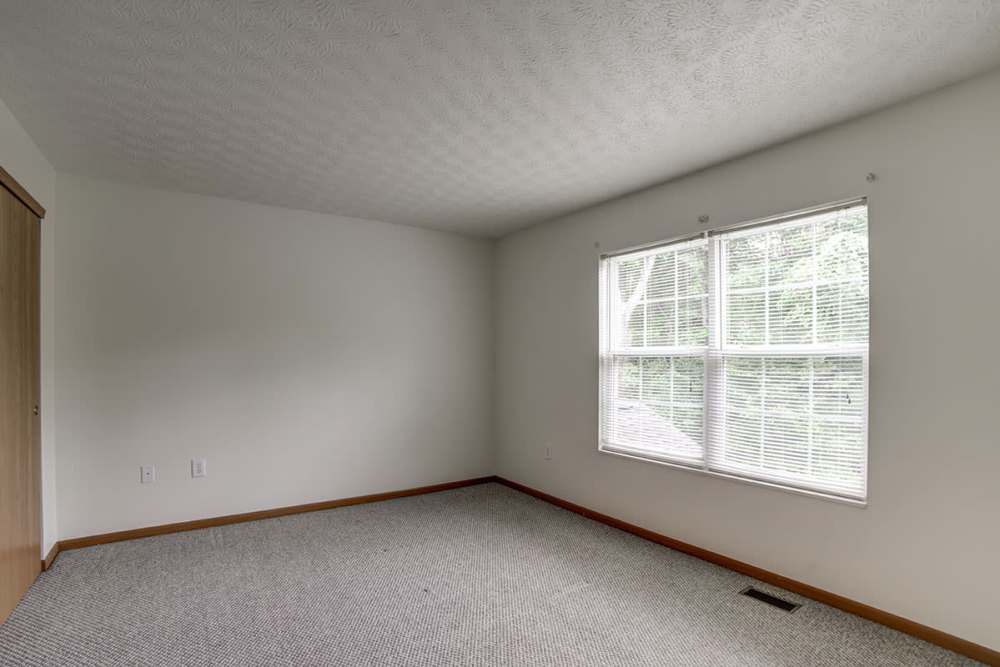 Bedroom with window at Crossroads Meadow in Ebensburg, Pennsylvania