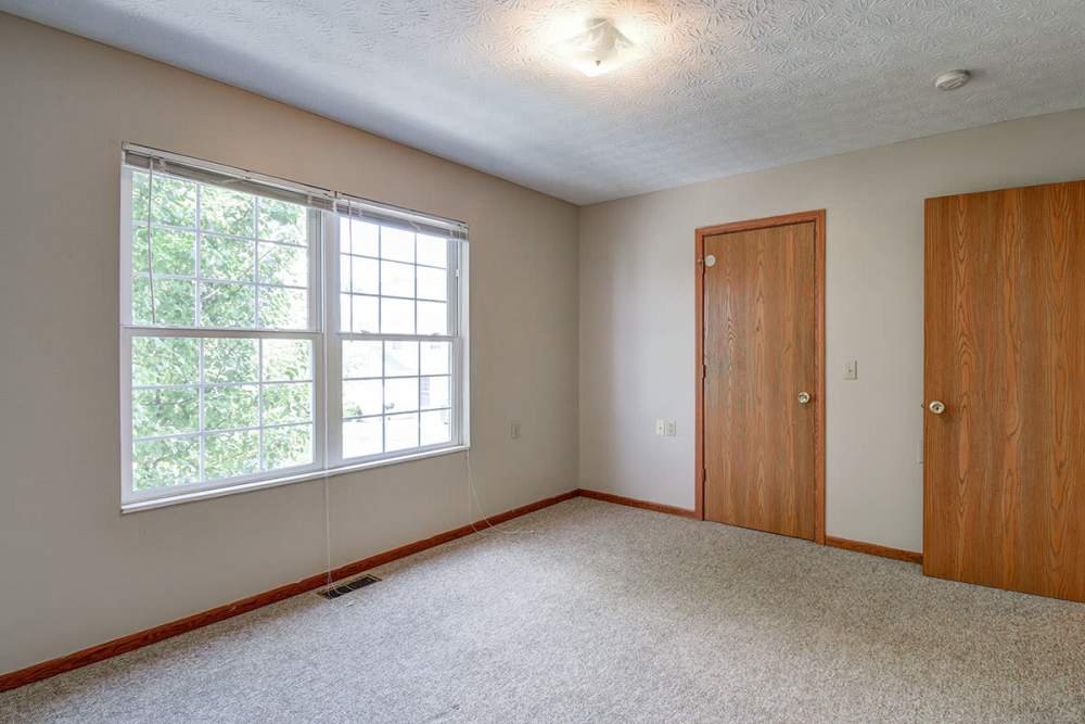 Bedroom with large size window at Edwards Crossing II in Beaver, West Virginia