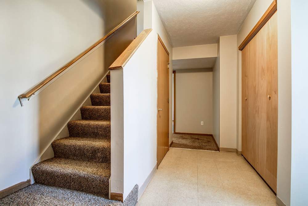 Carpeted staircase at Doranne Greene in Hartford. MI