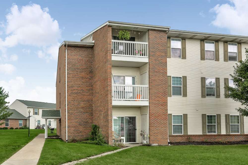 Brick exterior with balconies and windows at Laurelhurst in Clyde, Ohio