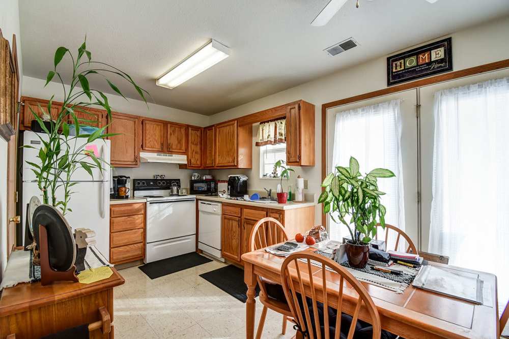 Beautiful home kitchen and dining area at Muirwood Greene in Romney, West Virginia