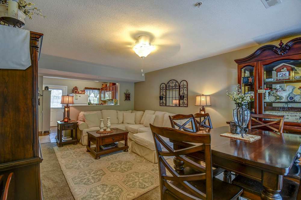 Dining area with access to living space at Oak Valley Gardens in Glenville. WV
