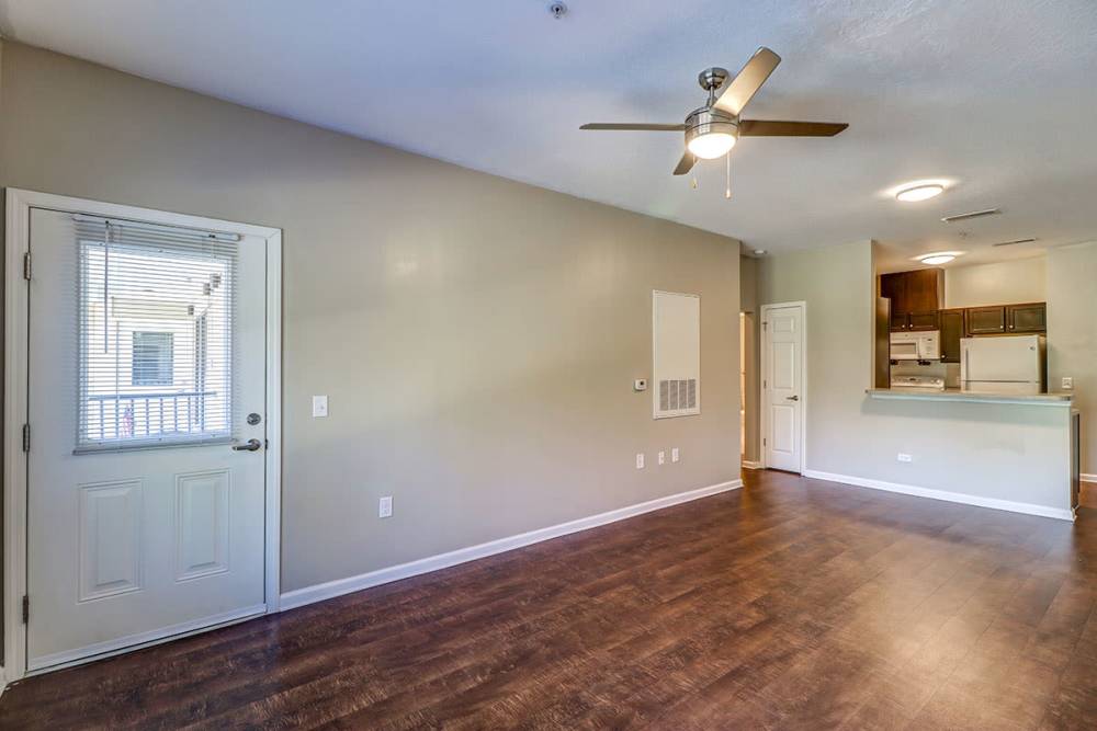 Living room with connecting kitchen at Silver Lakes in Madison, Georgia