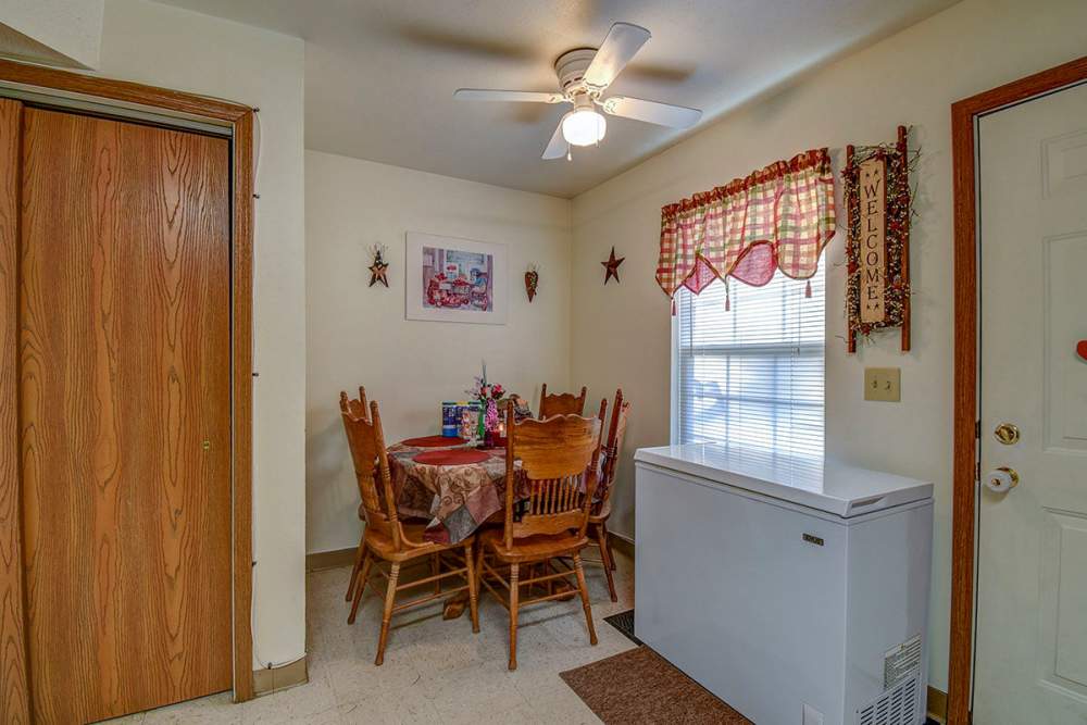 Dining area next to the kitchen at Yellowbud Place in Moorefield, West Virginia