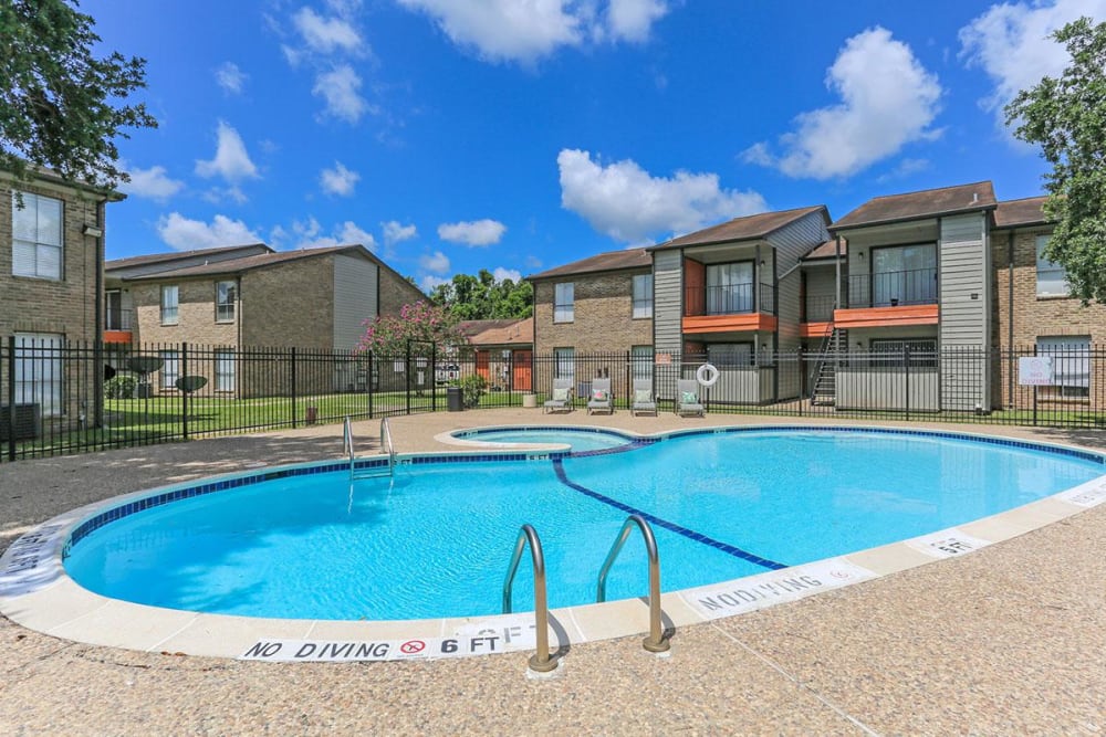 Swimming pool at CrescentWood Apartments in Clute, Texas