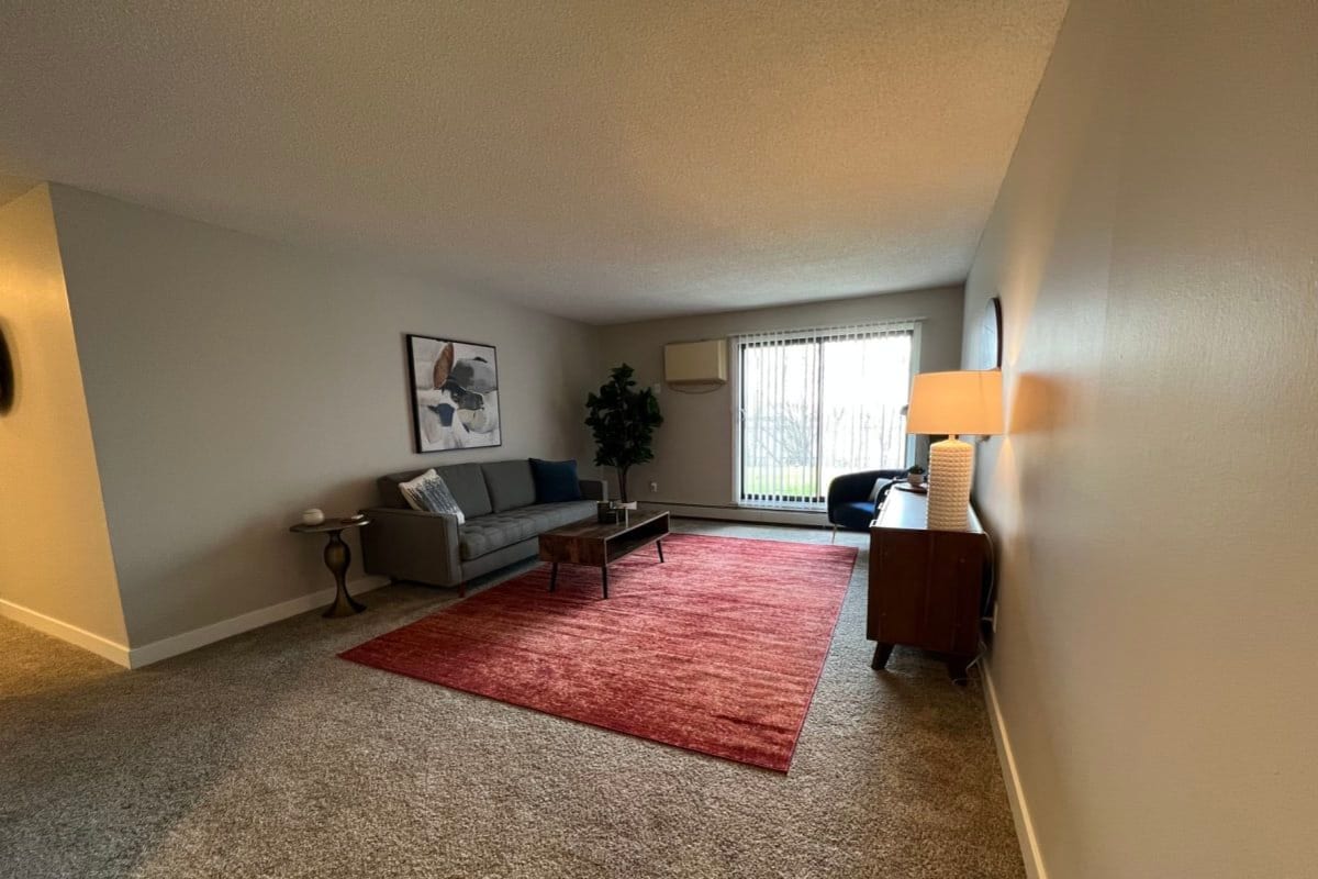 Apartment living room at The Pointe at Cedar Grove in Eagan, Minnesota