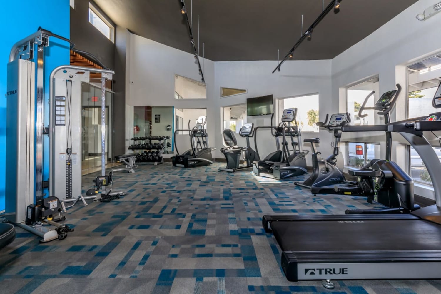 Equipment in the fitness center at Station 21 Apartments in Mesa, Arizona