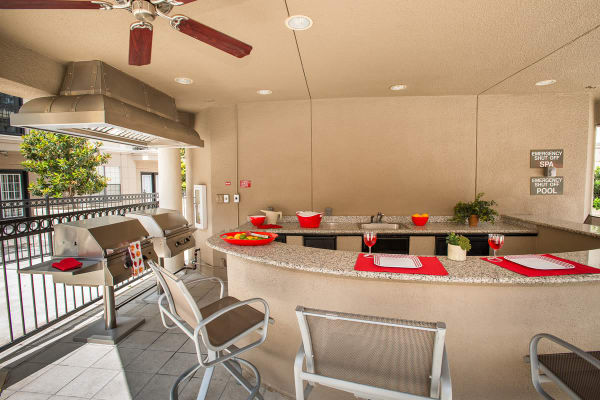 bbq area by the pool at Chateau de Ville