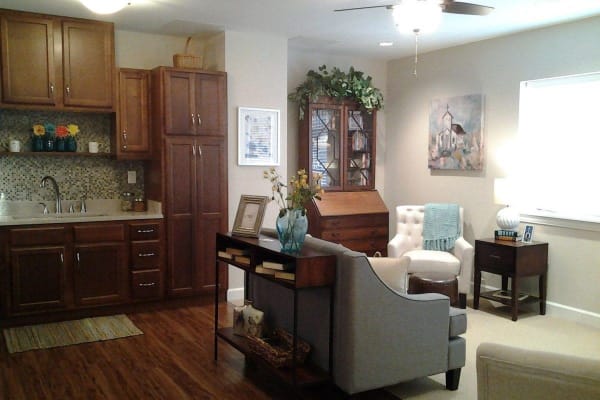 Kitchen and living room of an Independent Living Plus one bedroom apartment at Fair Haven