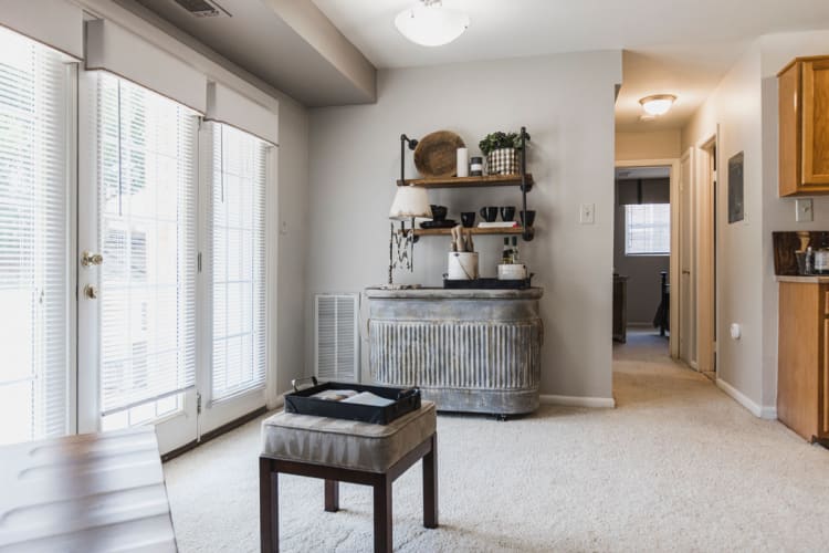 Dining nook next to french doors that open to private patio in model home at Westgate Apartments & Townhomes in Manassas, Virginia