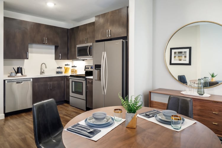 Lovely model dining room and kitchen at Latitude at Presidio in Cedar Park, Texas