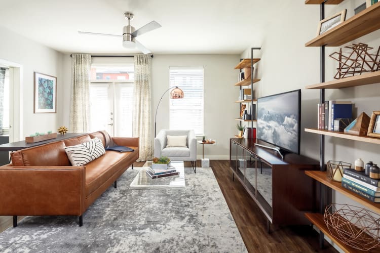 Modern living room and kitchen at Latitude at Presidio in Cedar Park, Texas