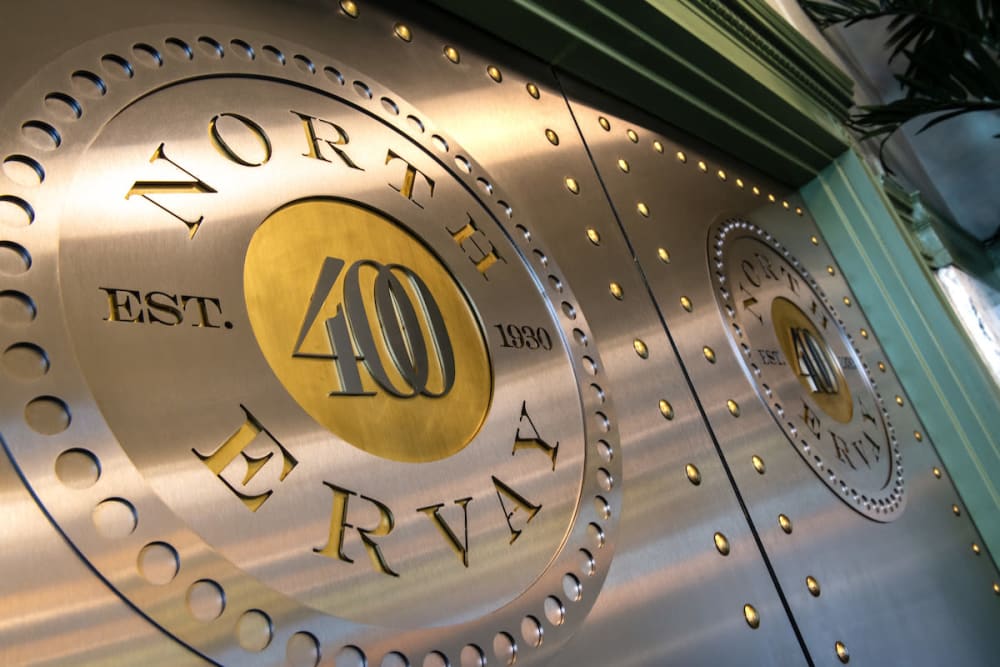 Metal sign at 400 North Ervay in Dallas. Texas