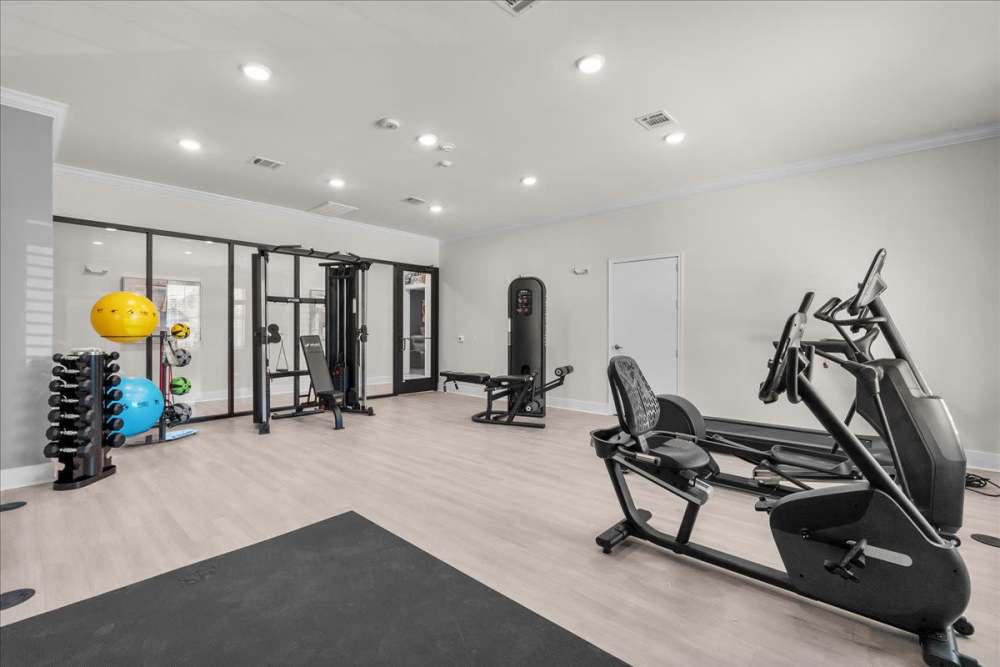 Fitness center with exercising equipments at Magnolia Living in League City, Texas