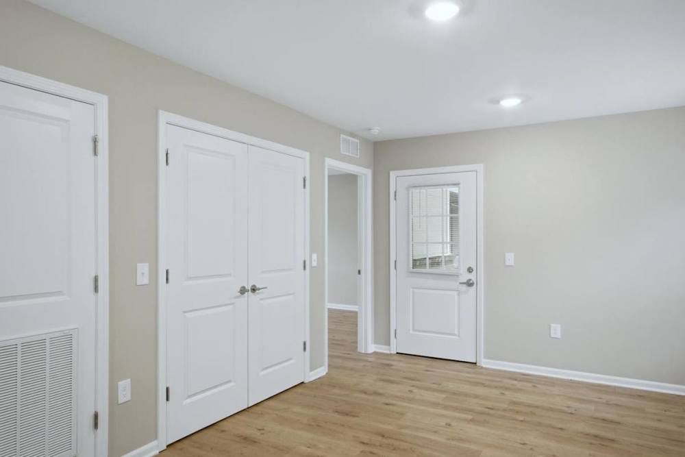 Unfurnished room with wood flooring at Prior Farms in Madison. GA