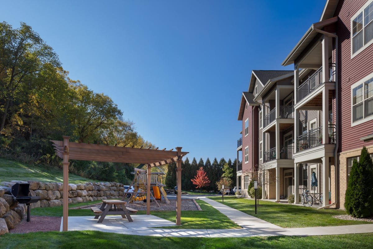 Griling and picnic area at Mill Creek Apartments in Cross Plains, Wisconsin
