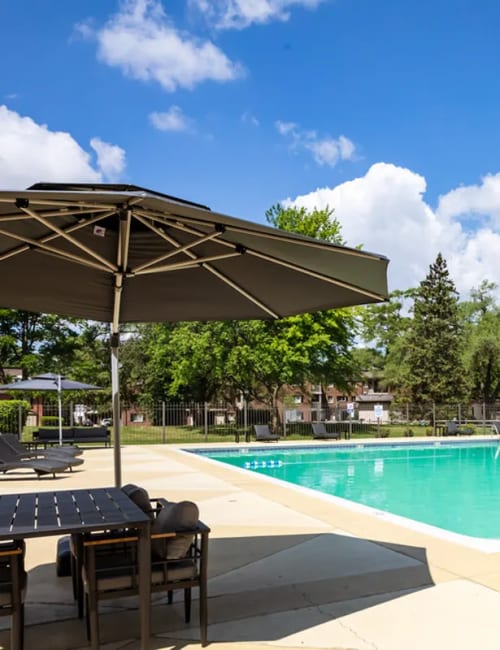 Swimming pool with sun loungers at Terraces of Elk Grove in Elk Grove Village, Illinois