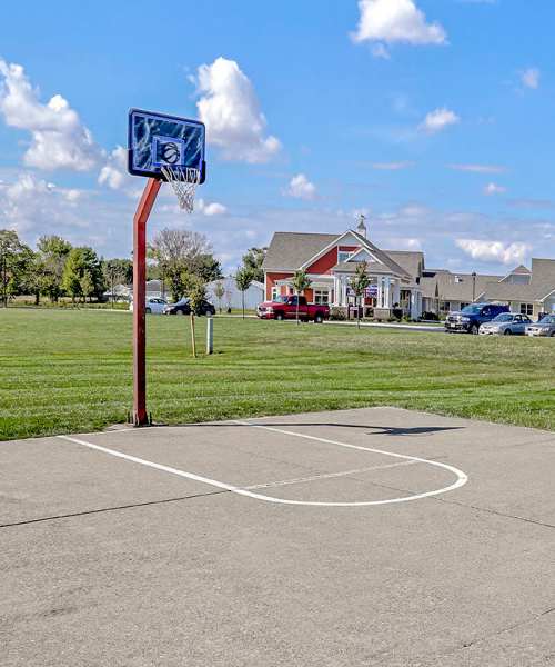 Basketball hoop on concrete court near Glennview Apartments in Washington Court House, Ohio