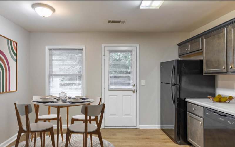 apartment kitchen with a back door at Lexington Heights in Athens, Georgia