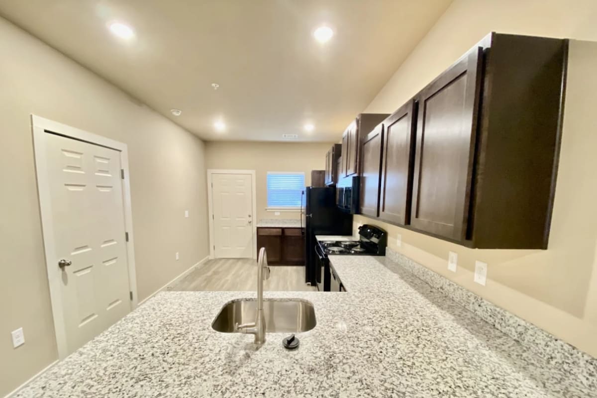 Kitchen with water sink at Atlas at Cabot in Cabot. AR