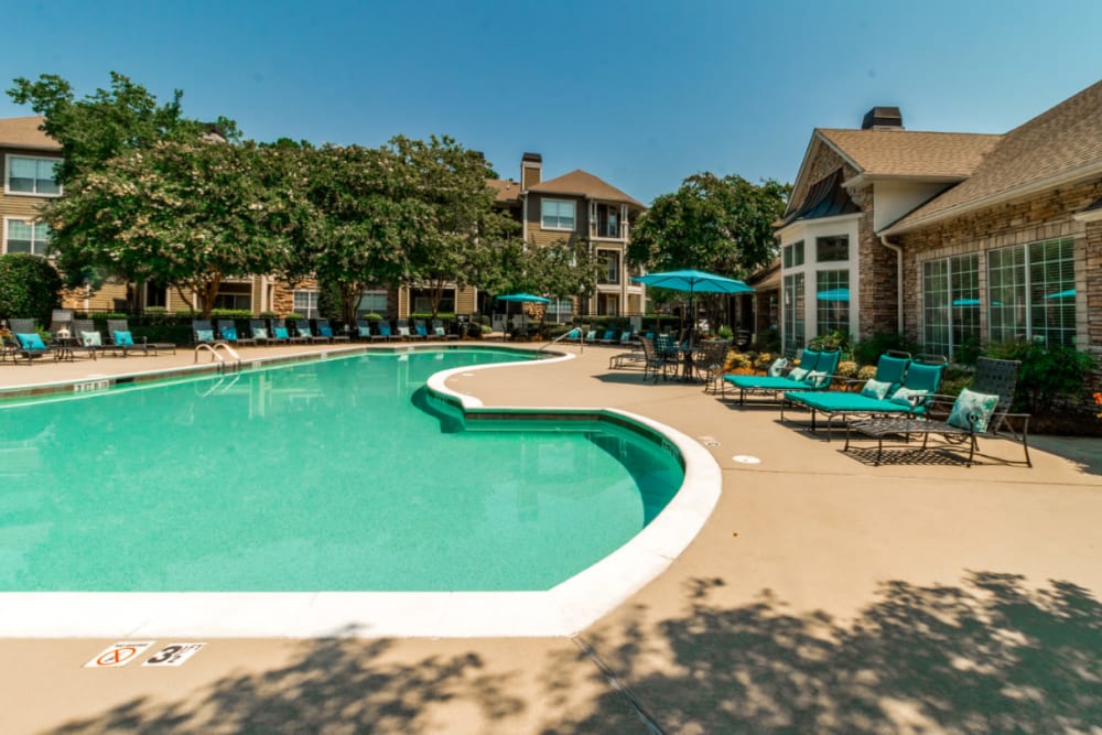 Shallow end of sparkling pool overlooking units at Marquis at Carmel Commons in Charlotte, North Carolina