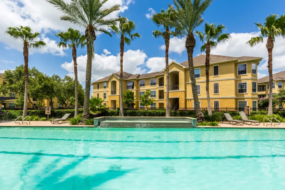 Resort style pool with swim lanes at Marquis at Clear Lake in Webster, Texas