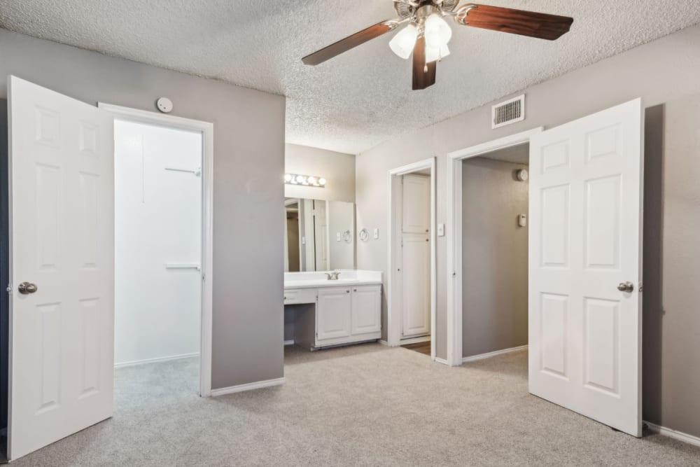 Modern apartment bedroom at Courts of Bedford in Bedford, Texas