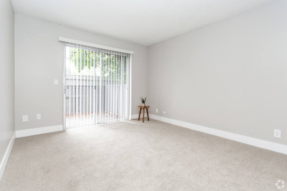 Living room with slider door at  The Marq in Santa Rosa, California