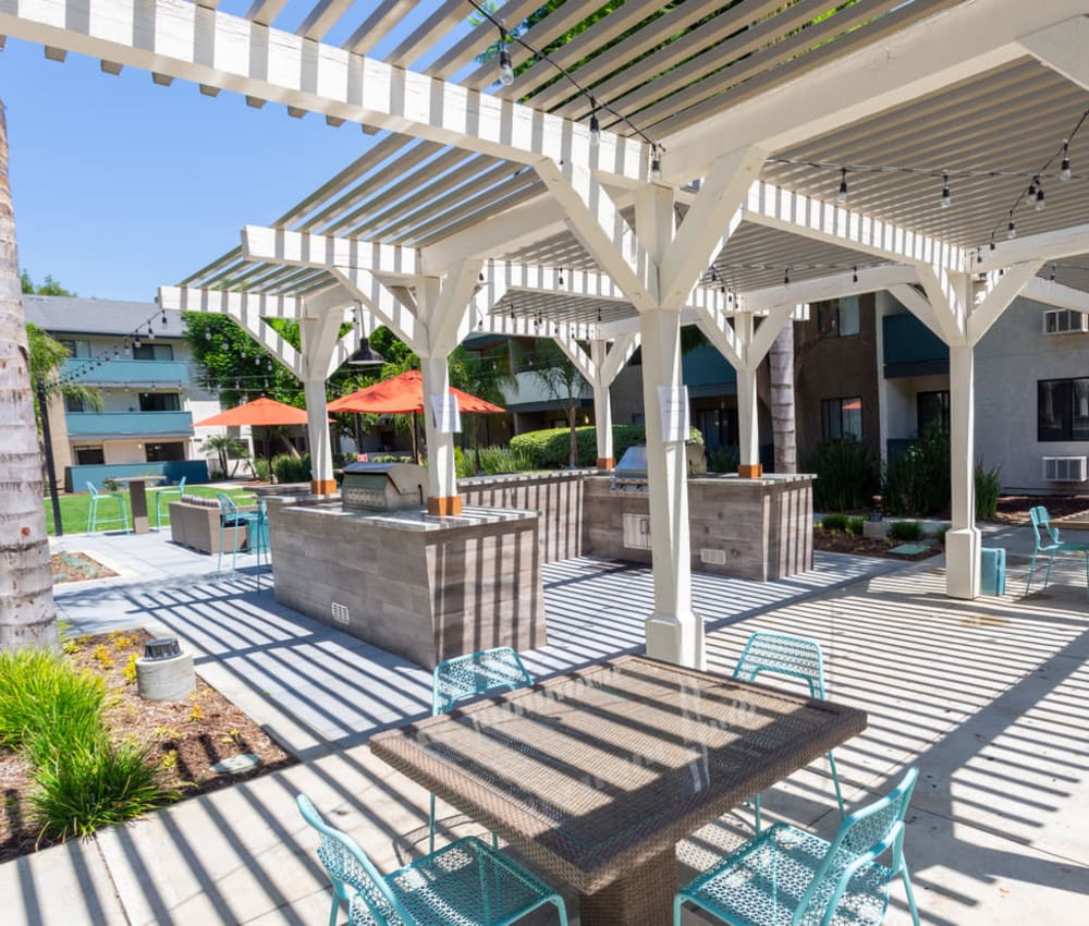 Large community barbecue area with gas grills at Haven Warner Center in Canoga Park, California