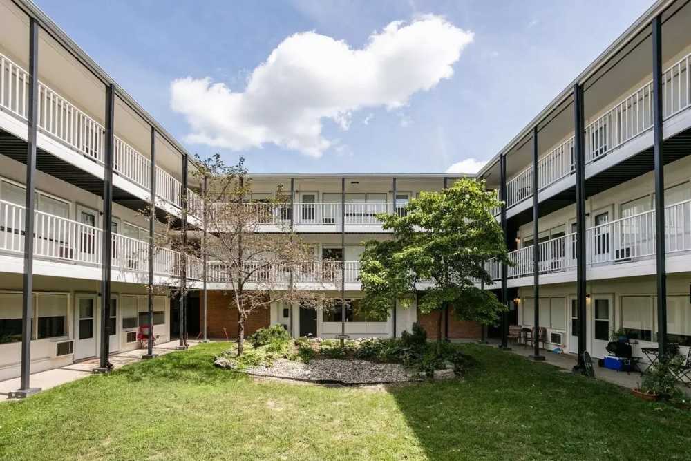 Exterior building with balcony at Detroit Living in Detroit, Michigan