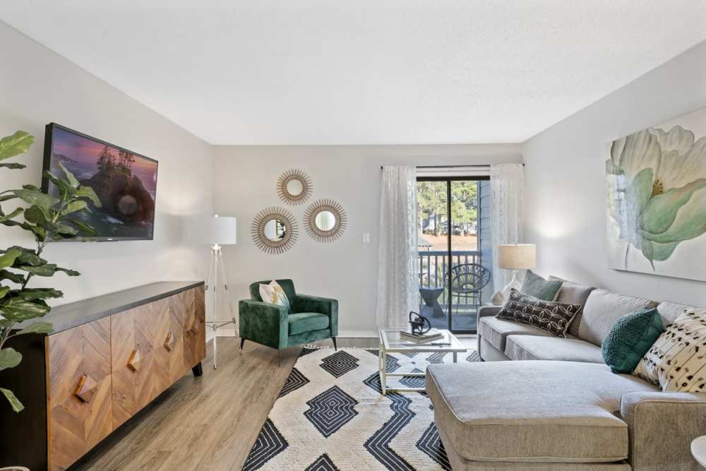 Spacious living room with window at Andover at Crabtree in Raleigh. NC