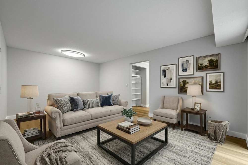 Cozy living room with neutral decor at Rock Ridge Commons in Moline, Illinois
