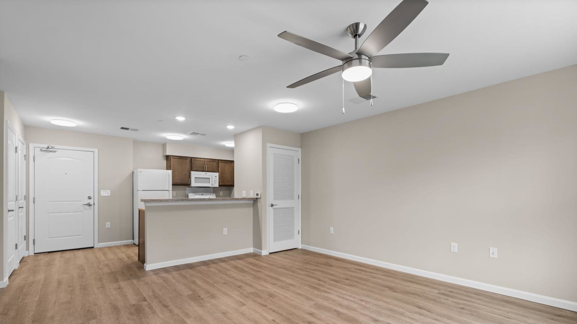 Living space with large ceiling fan Millersview Crossing in Millersville, Maryland