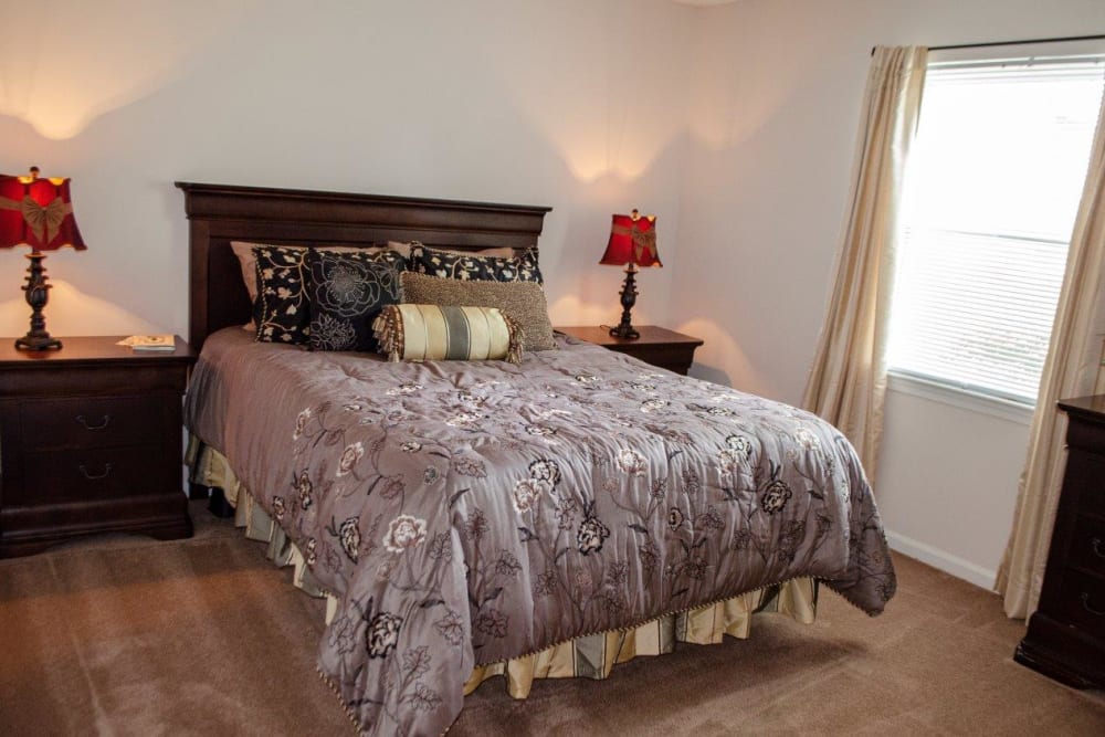 A furnished bedroom at Vista Villa in Charlotte, North Carolina