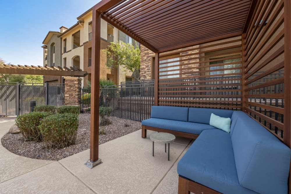 Gazebo with cushioned couch sitting area at Marquis at Sonoran Preserve in Phoenix, Arizona