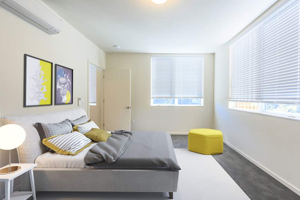 Specious bedroom with large window at Edison Apartments in Gresham, Oregon