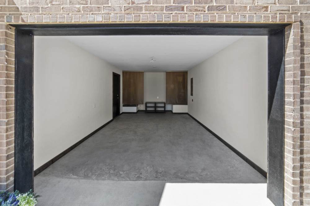 Parking garage at Settlers Trail Apartments in Lindale, Texas