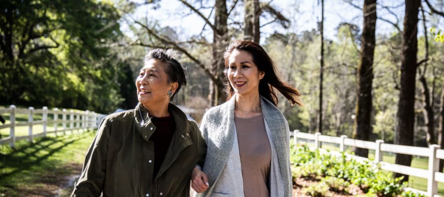 Residents on a walk at Olea eTown in Jacksonville, Florida