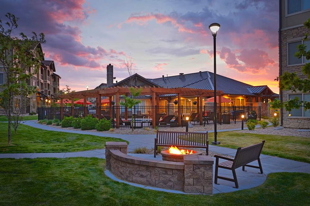 Outdoor seating with firepit at M2 Apartments in Denver, Colorado