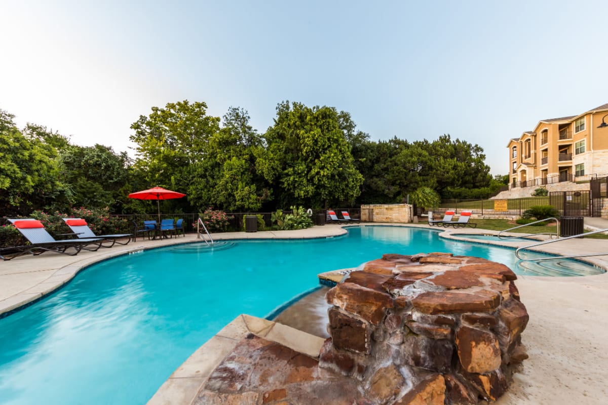 Resort-style swimming pool at Marquis at Canyon Ridge in Austin, Texas
