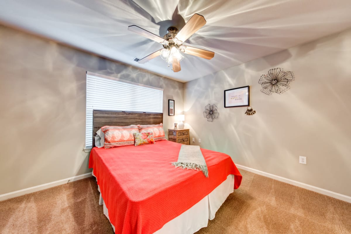 Carpeted cozy bathroom with large window at Marquis on Cary Parkway in Morrisville, North Carolina