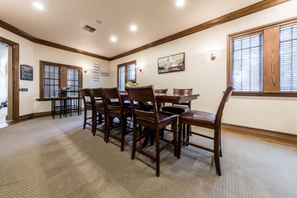 Community clubhouse large dining table at Marquis at Waterview in Richardson, Texas