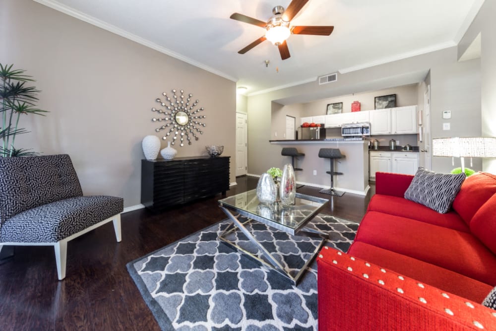 Dining room with wood style flooring at Marquis at Legacy in Plano, Texas