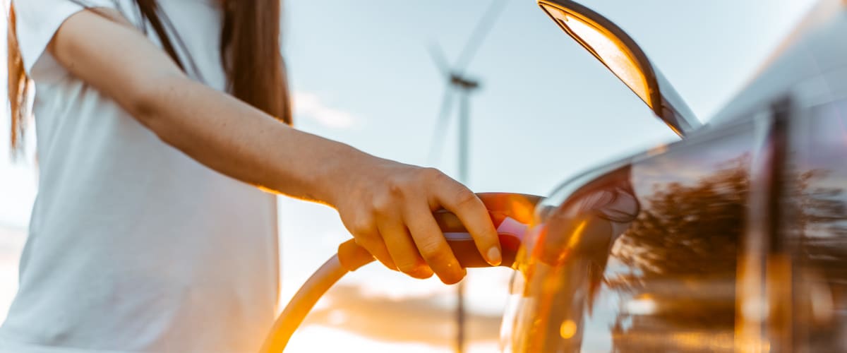 Student filling her tank near Rise Manoa in Honolulu, Hawaii