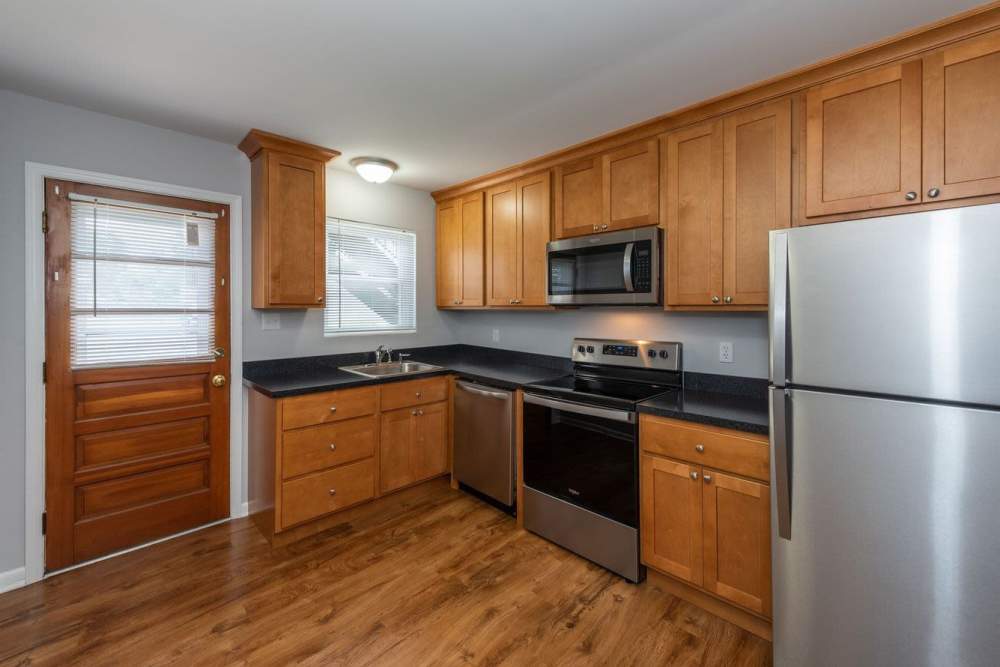 Fully-equipped kitchen with stainless-steel appliances at Signal Point Apartments in Mechanicsville, Virginia