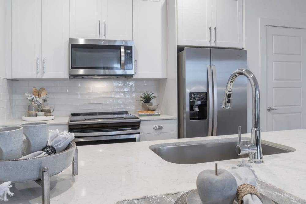 Fully equipped stainless steel kitchen at The Collins in Charlotte, North Carolina