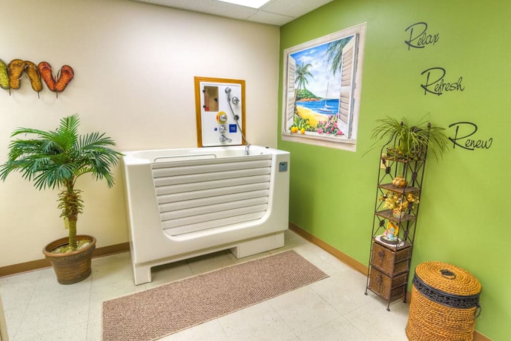 Spa with green accent wall at Addington Place of Fairfield in Fairfield, Iowa